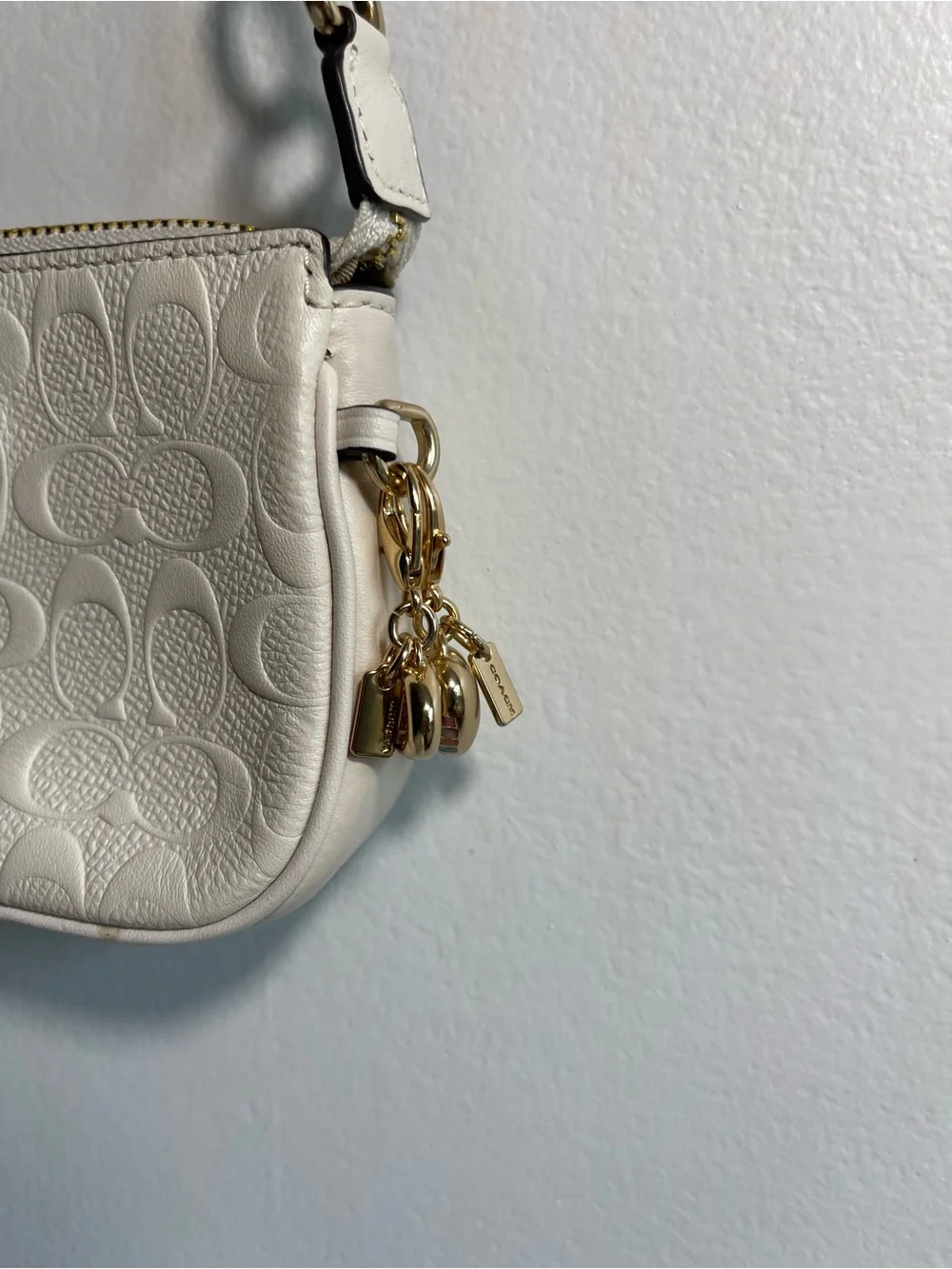 Coach Cream Signature Embossed Leather Mini Wristlet with Gold Accents